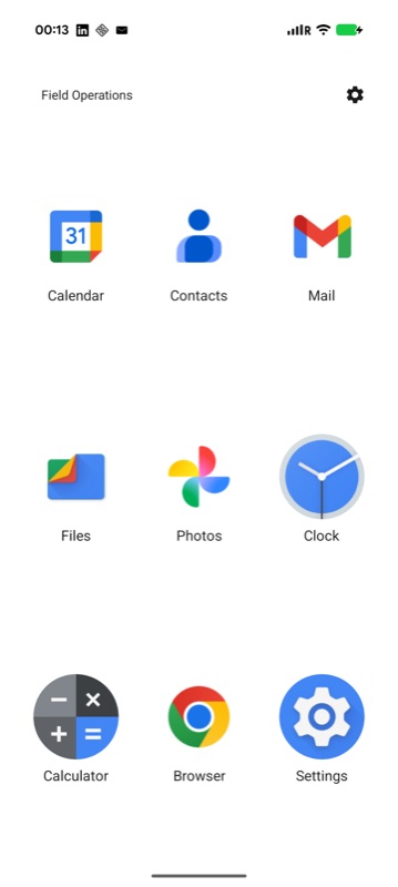 A KAG-built kiosk on a Pixel showing a 3 by 3 grid of large app icons with a Field Operations banner and a settings cog.